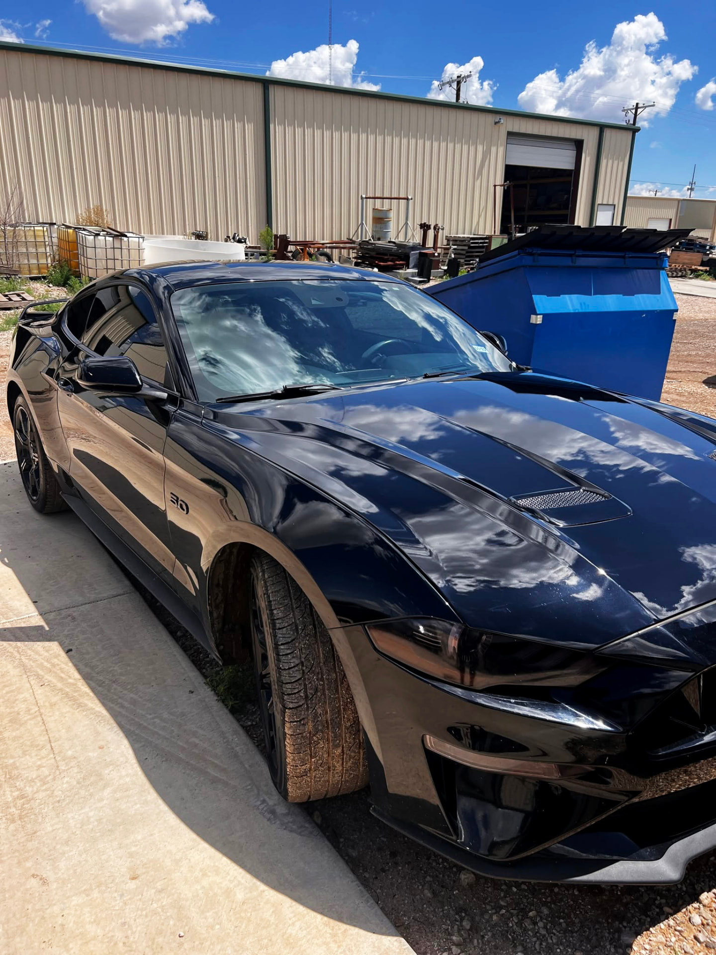 The same Mustang after paintless dent repair